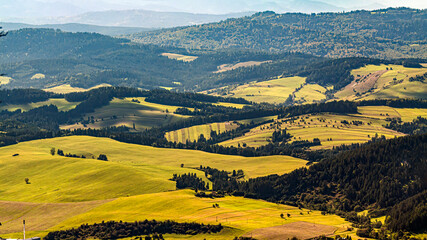 Breathtaking Rolling Hills and Green Fields Across a Sunlit Countryside Landscape Panorama