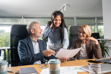 Business team analyzing financial results of company or startup project