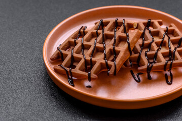 Belgian waffles, a healthy sweet breakfast dessert, food background. Belgian waffles