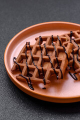 Belgian waffles, a healthy sweet breakfast dessert, food background. Belgian waffles