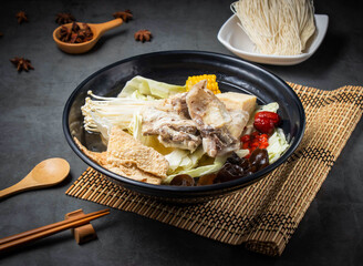 Savory Asian hot pot with fresh vegetables and tender meat perfect for a comforting, flavorful meal on a cold winter evening