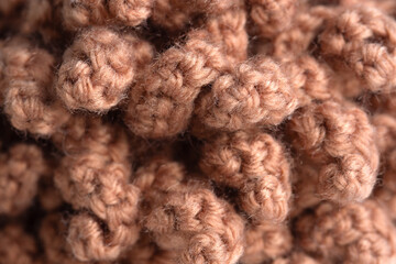 Authentic closeup of crocheted curls with rich fiber texture.