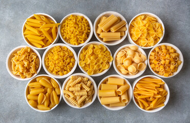 Composition with different tasty uncooked pasta - Italian pasta wallpaper, different types and shapes of pasta layout