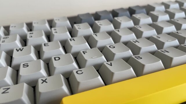 Close-up of a computer keyboard with letters and keys for business work and internet communication