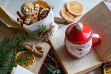 On the table there is New Year's tea 2026, coffee, gingerbread and pine cone cookies.