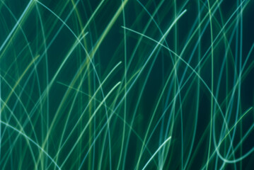 Abstract green lines create a dynamic swirl pattern.