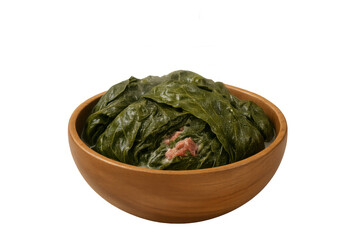 Hawaiian laulau stew with luau leaves, taro and coconut milk serving traditional polynesian cuisine in wooden bowl