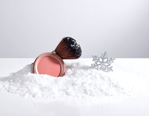 Winter beauty: Blush powder, brush, and snowflake in a snowy scene evoking glamour