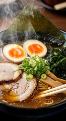 Delicious steaming ramen bowl with egg pork and seaweed