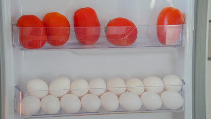 eggs stacked inside refrigerator