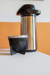 Argentine mate tea next to a thermos