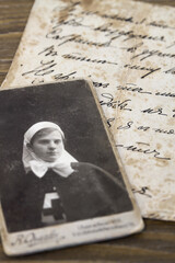 Vintage photo of the hospital nurse 1910s. Part of a letter on the back of a old photo during the 1917 revolution:
"Proudly stand...
Save in your soul....
Don't call fate....."
Further illegible