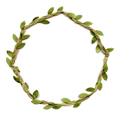 Floral frame for congratulatory text made of jute with green leaves. Round shape