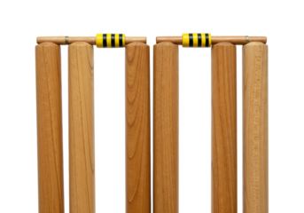 Classic hardwood cricket stumps with striped bails in a macro shot on a transparent background with shallow depth of field. Celebration of classic sports heritage