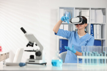 Modern technology. Doctor using virtual reality headset in office