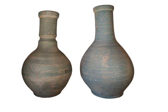 Two old ceramic vases in light blue colour