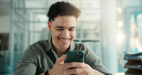 Break, social network or happy man with phone in office, watch funny video or reading joke message. Smile, texting or employee with mobile in workplace, check comic blog or browsing internet for meme