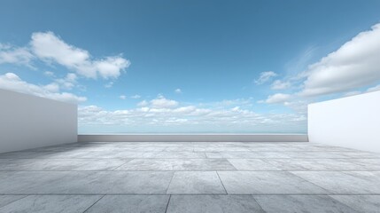 Fototapeta premium Minimalist Concrete Terrace Overlooking Ocean with Clear Blue Sky and Clouds Offering Open Space for Creative Concepts