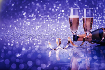 Champagne bottle and flutes with golden ribbons against a sparkling purple background, celebrating luxury.