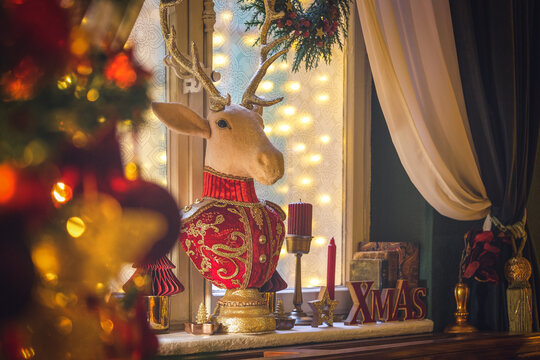 Christmas home decor, set-ups and decorations. Christmas spirit and home decor with a lot of details, in a warm and gentle light with a rich bokeh.