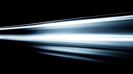 Fototapeta premium Dynamic Abstract Light Trails on Black Background, Representing High Speed and Movement