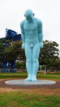 Las Palmas, Gran Canaria, Canary Islands, Spain - October 23, 2025 - Greetingman, the six-meter-tall light blue sculpture by Korean artist YOO Young-ho, bowing in welcome and showing respect
