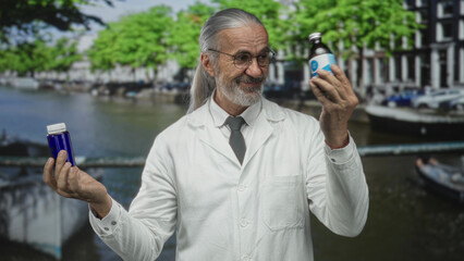 Man scientist in lab coat holds two bottles in hands on street in amsterdam; testing research...