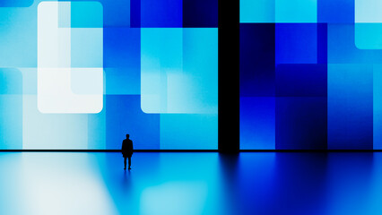 Silhouette of a man against a digital blue geometric background