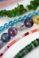 Close up of Gemstone Beads in Various Colors and Shapes
