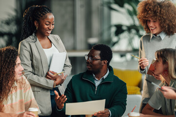 Diverse team collaborating in office meeting