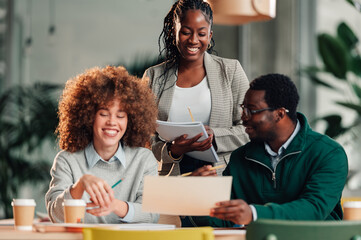 Diverse business team collaborating during office meeting