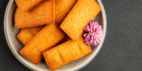 Financier biscuit cookie sweet dessert appetizer fresh tasty gourmet food table setting rustic food top view copy space