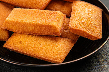 Financier biscuit cookie sweet dessert appetizer fresh tasty gourmet food table setting rustic food top view copy space