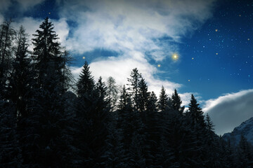 Abstract stars sky in a winter mountains.