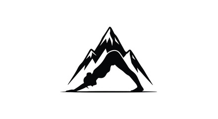 Silhouette of a woman in downward dog yoga pose against a mountain backdrop