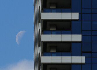 Minimalist Urban Architecture Detail with Half Moon and Geometric Balconies 