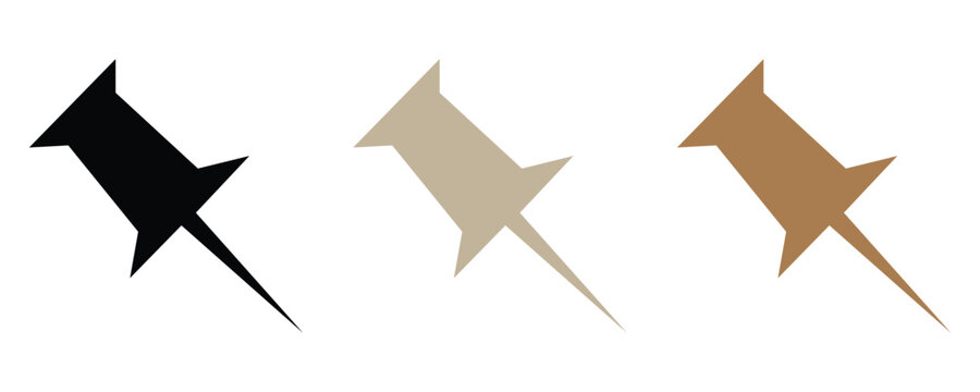 Organized reminders with push pins in black, tan, and brown for a modern, minimalist office or workspace bulletin board aesthetic