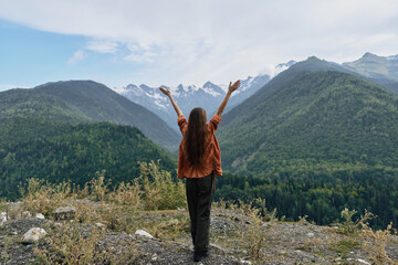 Naklejka premium Woman mountain nature, inclusive authentic