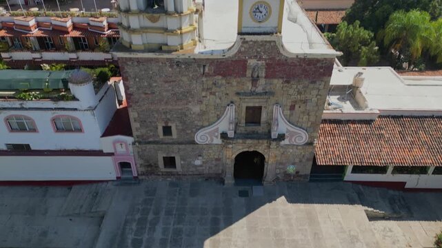 Drone panning shot showing the historic chapel of Our Lady of the Rosary in Ajijic Jalisco Mexico