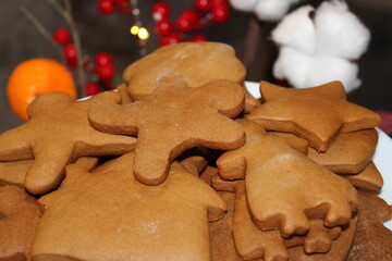 Freshly baked gingerbread cookies on a plate for holiday celebrations in a cozy home setting during winter