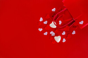 Valentine day sale and shopping background . Red paper shopping bag with text sale, white, red,...