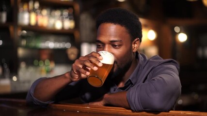 A man drinking beer at the bar  Stock Video