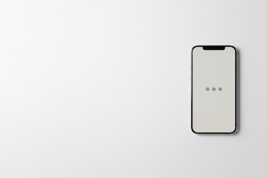 A smartphone with a loading screen and three dots. Space for text.