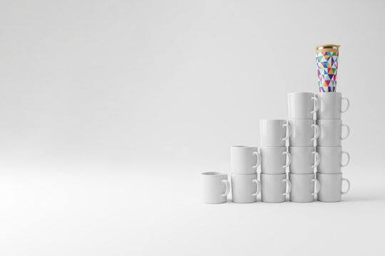 One bright mug at the top of a pyramid of white cups. Space for text.
