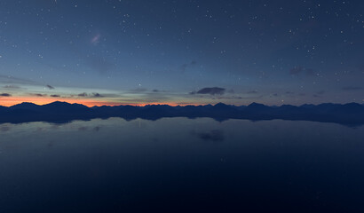 Fototapeta premium Starlit Night Sky Over a Mountain Range Reflected on Calm Water at Sunset