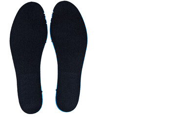Shoe inserts on a white background. Comfortable orthopedic shoe accessories. Photo taken with flash.