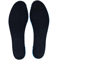 Shoe inserts on a white background. Comfortable orthopedic shoe accessories. Photo taken with flash.