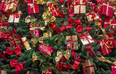 Background with gifts in the Christmas tree