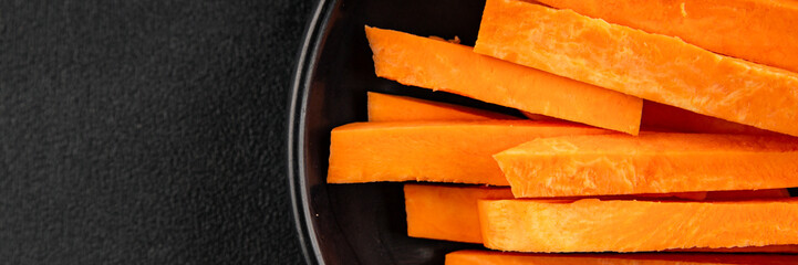 Raw sweet potato slices tasty snack fresh delicious gourmet food table background rustic top view...