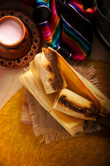 Tamales. Traditional dish typical of Mexico and some Latin American countries. Corn dough wrapped in corn leaves. The tamales are steamed.